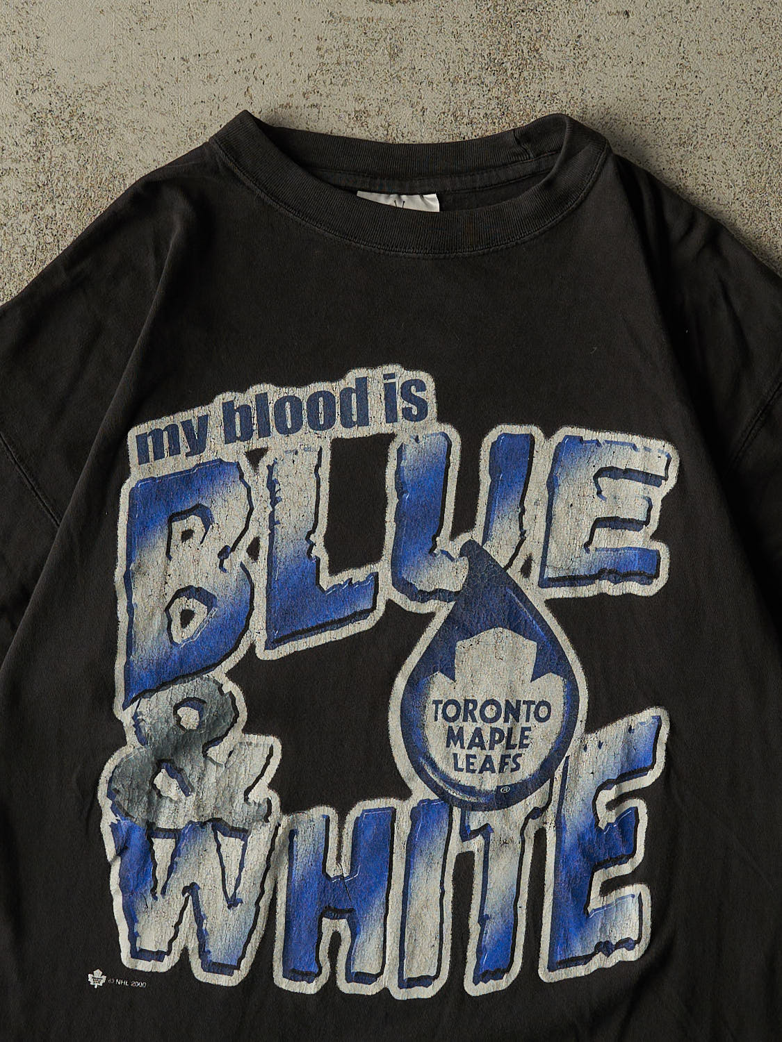 Vintage 00' Black Toronto Maple Leafs "Blue & White" Slogan Tee (L) - Image 2