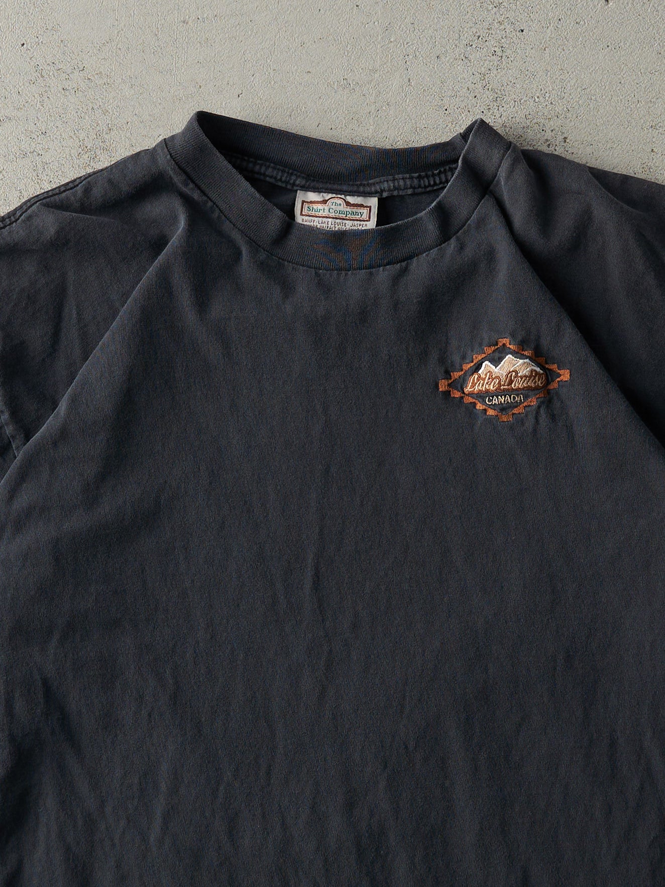 Vintage 90s Faded Black Embroidered Lake Louise Tee (L) - Image 2