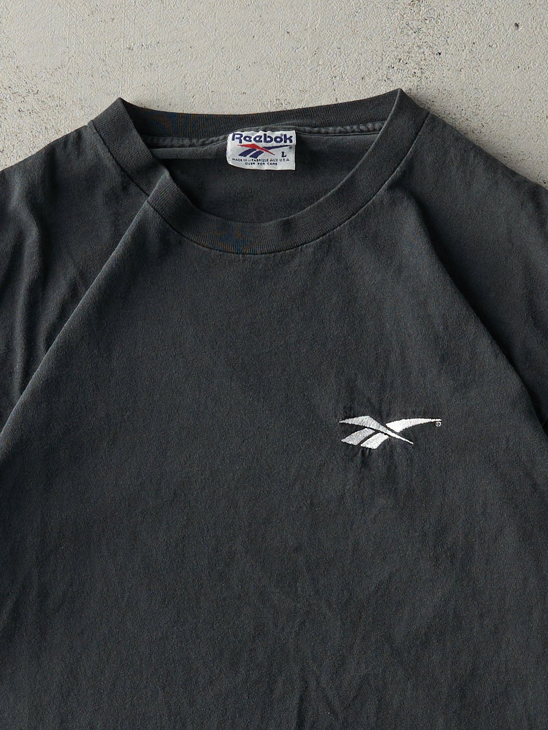 Vintage 90s Faded Black Embroidered Reebok Logo Tee (M/L) - Image 2