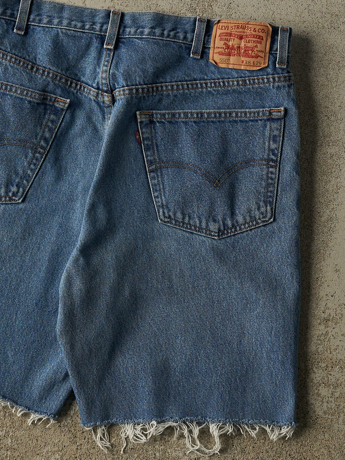 Vintage 90s Mid Wash Levi's 550 Cut Off Jean Shorts (36x9.5) - Image 5