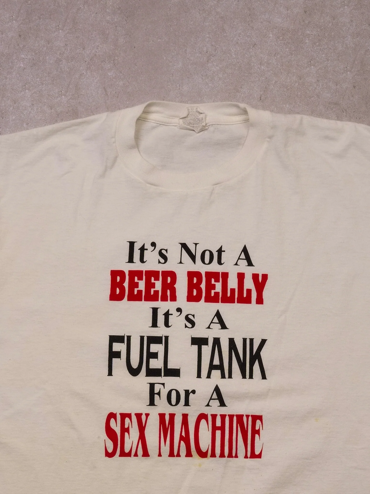 Vintage 90s White "It's Not A Beer Belly It's a Fuel Tank For A Sex Machine" Tee (L/XL) - Image 2