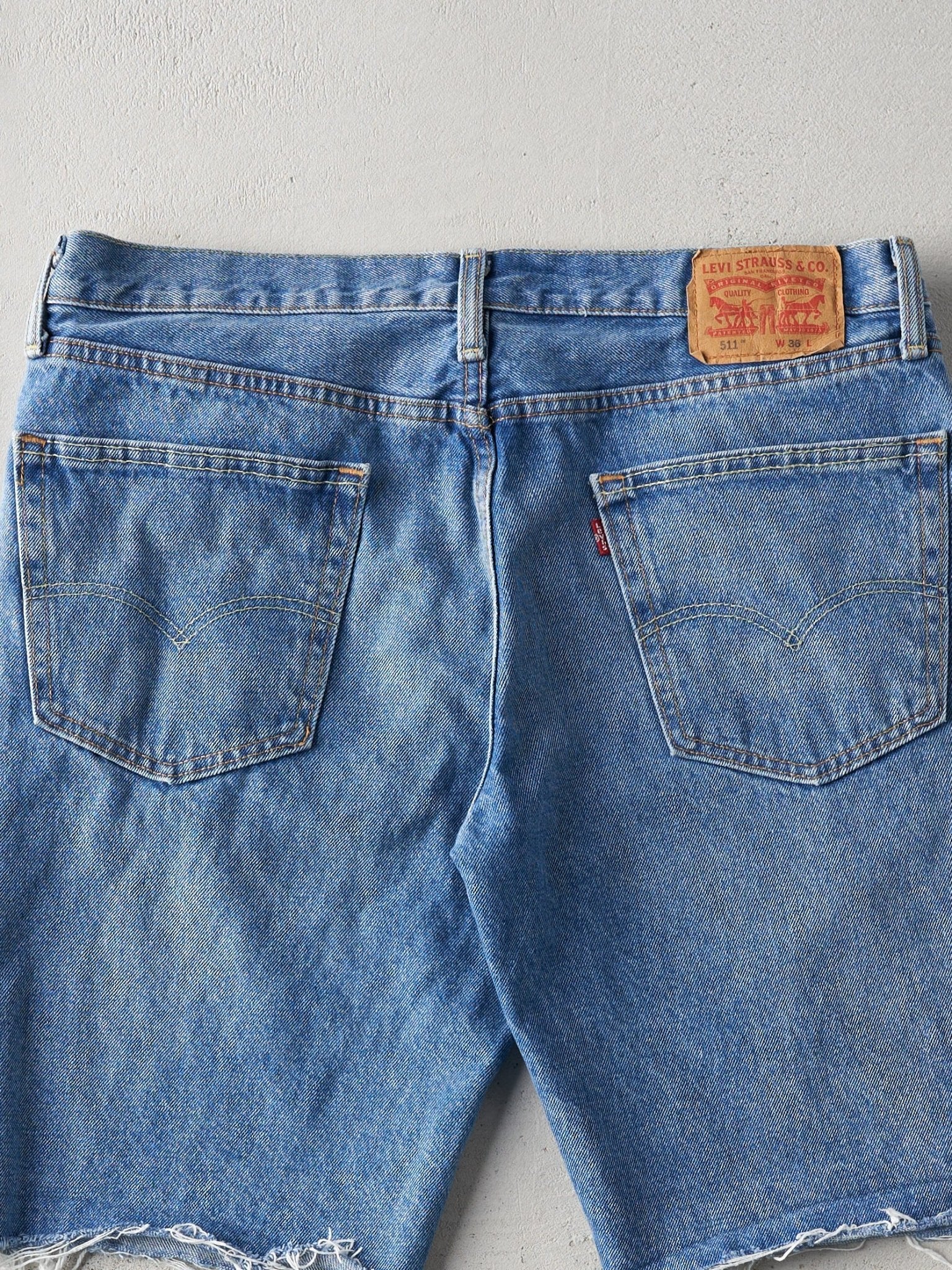 Vintage Light Wash Levis 511 Cut Offs (36x10.5) - Image 4
