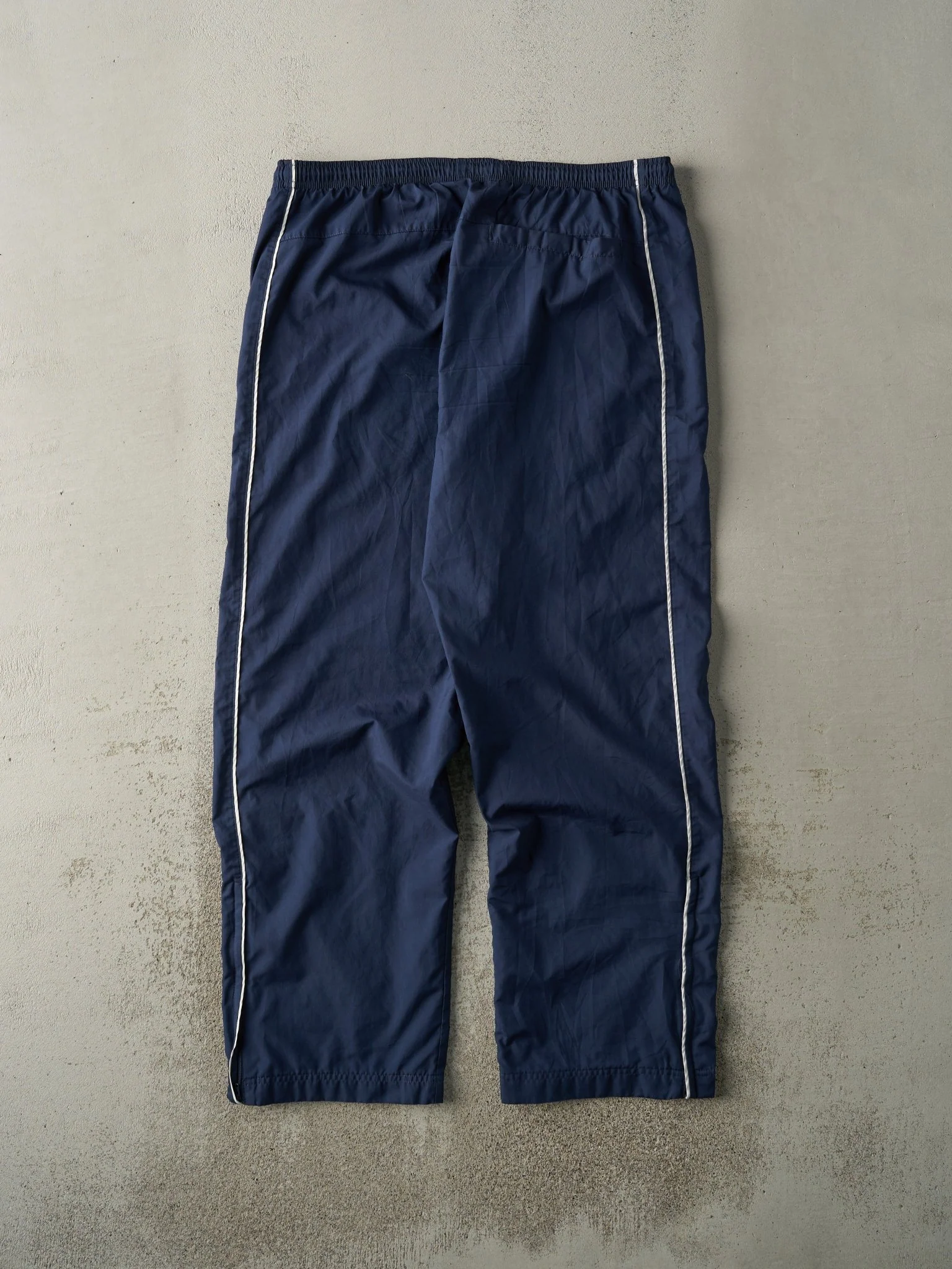 Vintage Y2K Navy Blue Nike Embroidered Windbreaker Pants (38x32.5) - Image 2